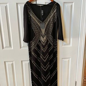 St. John Couture Dress. 3/4 sleeves. Evening gown, slit up the back.